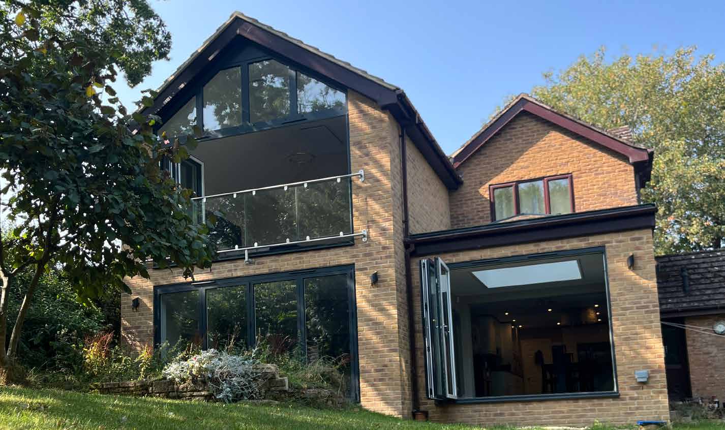Two-storey rear extension with glass balcony, Cheltenham