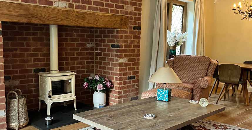 Inglenook fireplace with log burner
